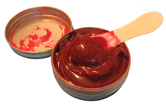 red rubber grease spoonful