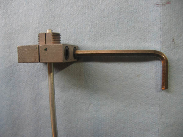 image of tighten brake line in double flaring tool block